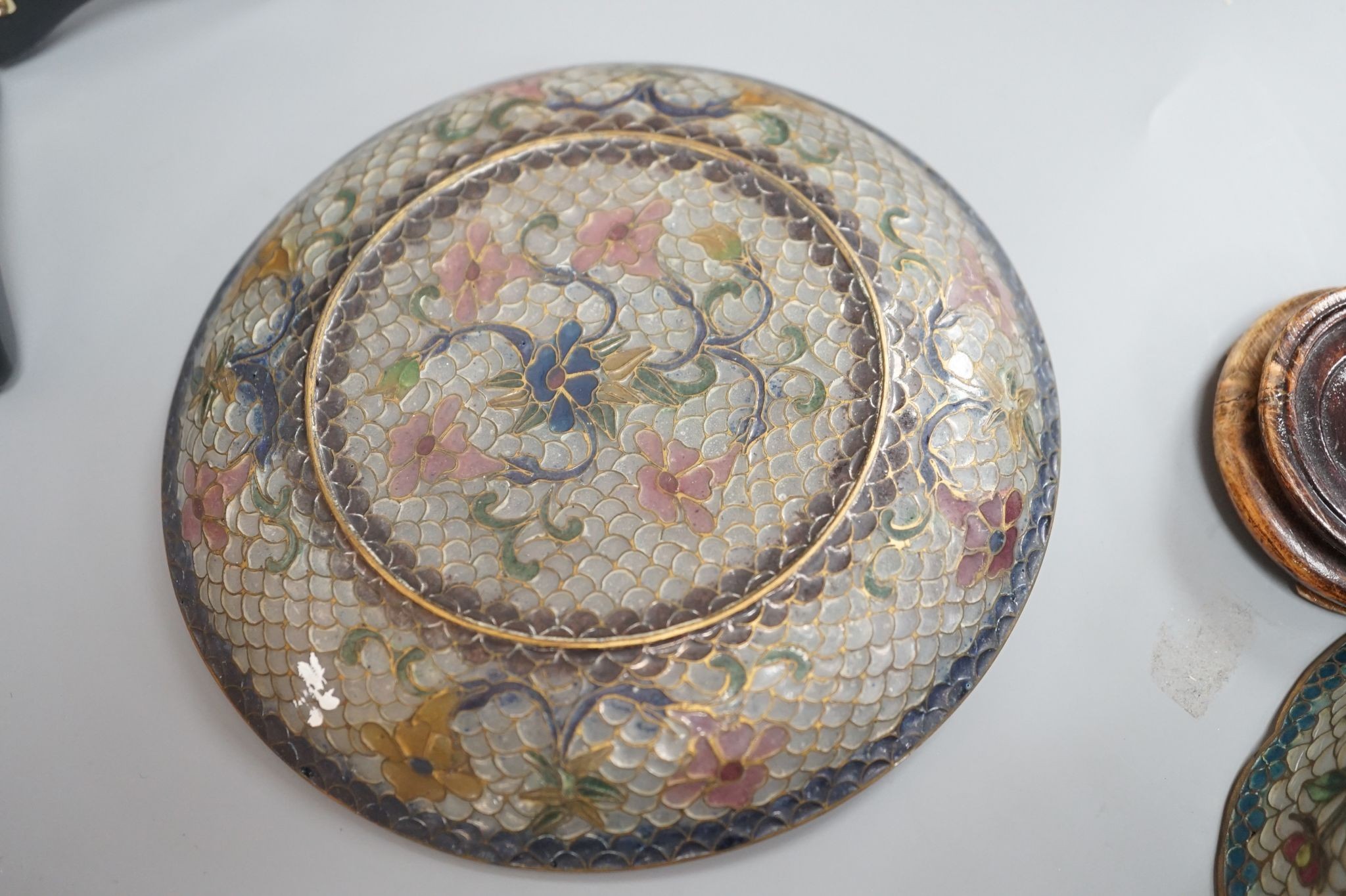 A Chinese plique a jour enamel cup and saucer 13cm diameter